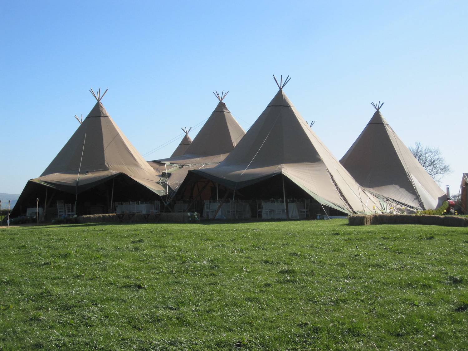 From cosy and intimate spaces to grand and spacious layouts, our tipi floor plans offer a unique and versatile option for any event. With their signature design and elegant canvas walls, our tipis can be configured in a variety of ways to suit your specific needs and preferences. Whether you're hosting a wedding, corporate event or private party, our expert team can work with you to create the perfect floor plan for your event.