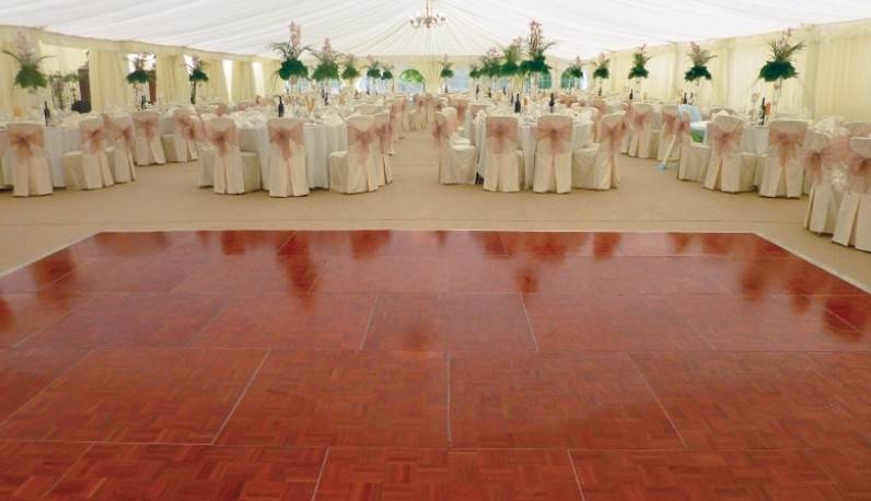 Parquet Wooden Portable Dance Floor with Non-Slip Surface and Elegant Parquet Pattern - Perfect for Weddings and Events | Origami Marquees