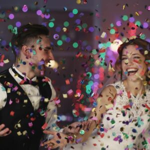 Wedding Couple Dancing in Confetti from a Confetti Cannon Set for hire